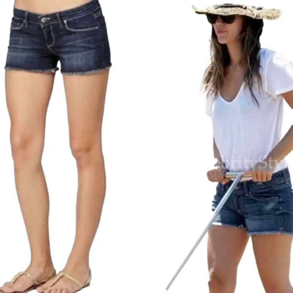 PAIGE Medium Wash Cut Off Raw Hem Jeans Shorts